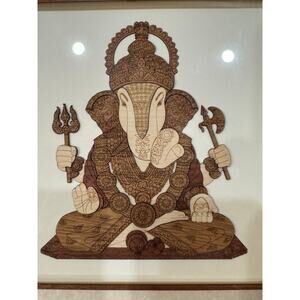 Sitting Lord Ganesha Wood Carved Framed Wall Hanging by Exotic India
Art 10”x10”